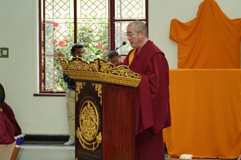 Head Abbot of Namdroling Monastery Gyang Khang Chotrul Rinpoche addressing the gathering